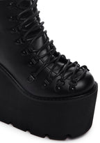 Traitor Boots